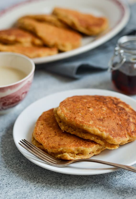 Vegan Cornmeal Pancakes with Maple Tahini Drizzle | The New Baguette