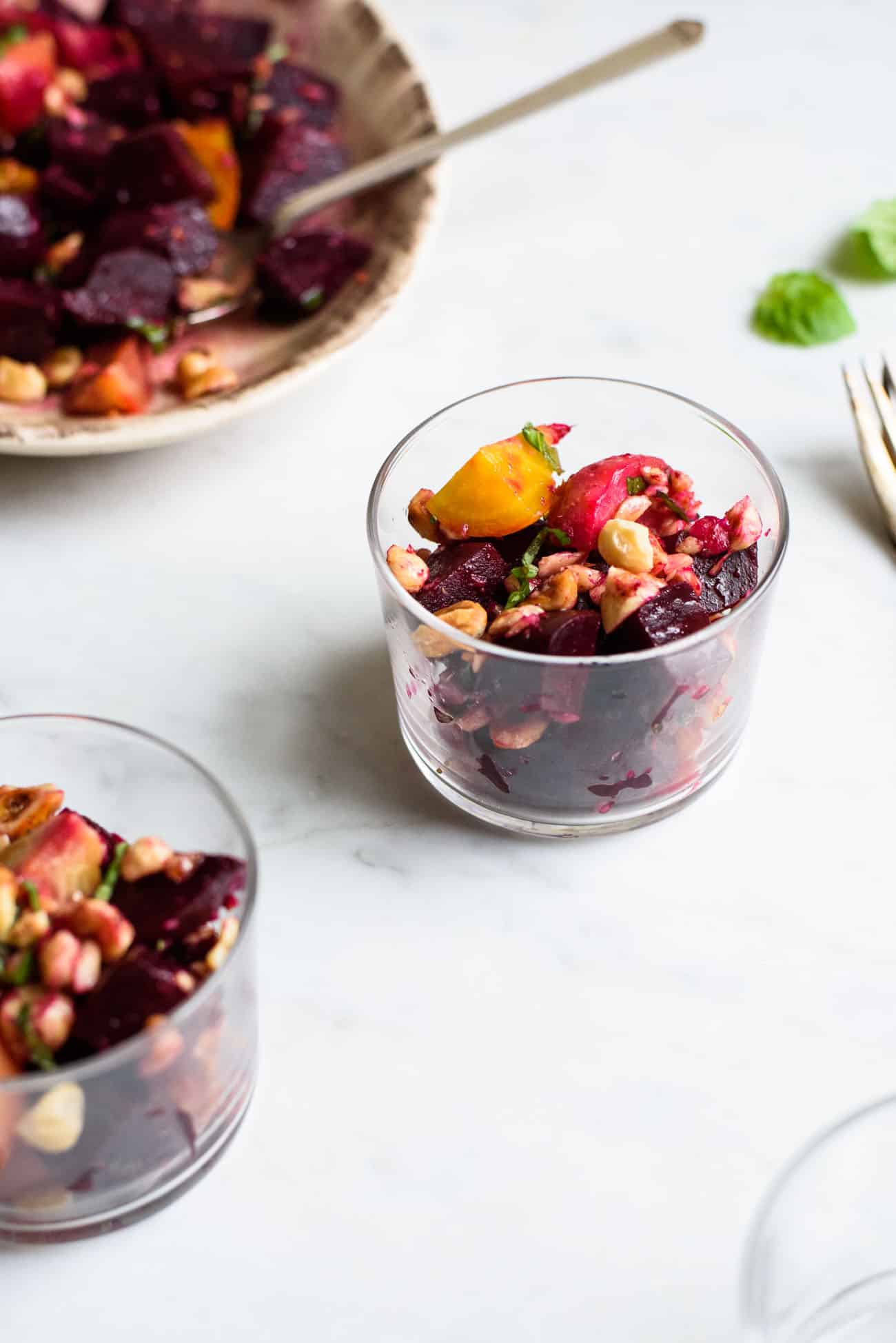 Rainbow Beets with Hazelnuts and Basil in small glass serving cups