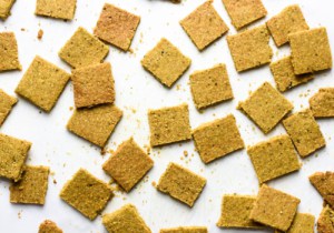 Close-up overhead image of healthy homemade crackers made with nutritional yeast and turmeric