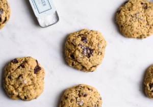 Chickpea Chocolate Chip Cookies on a marble board with sea salt
