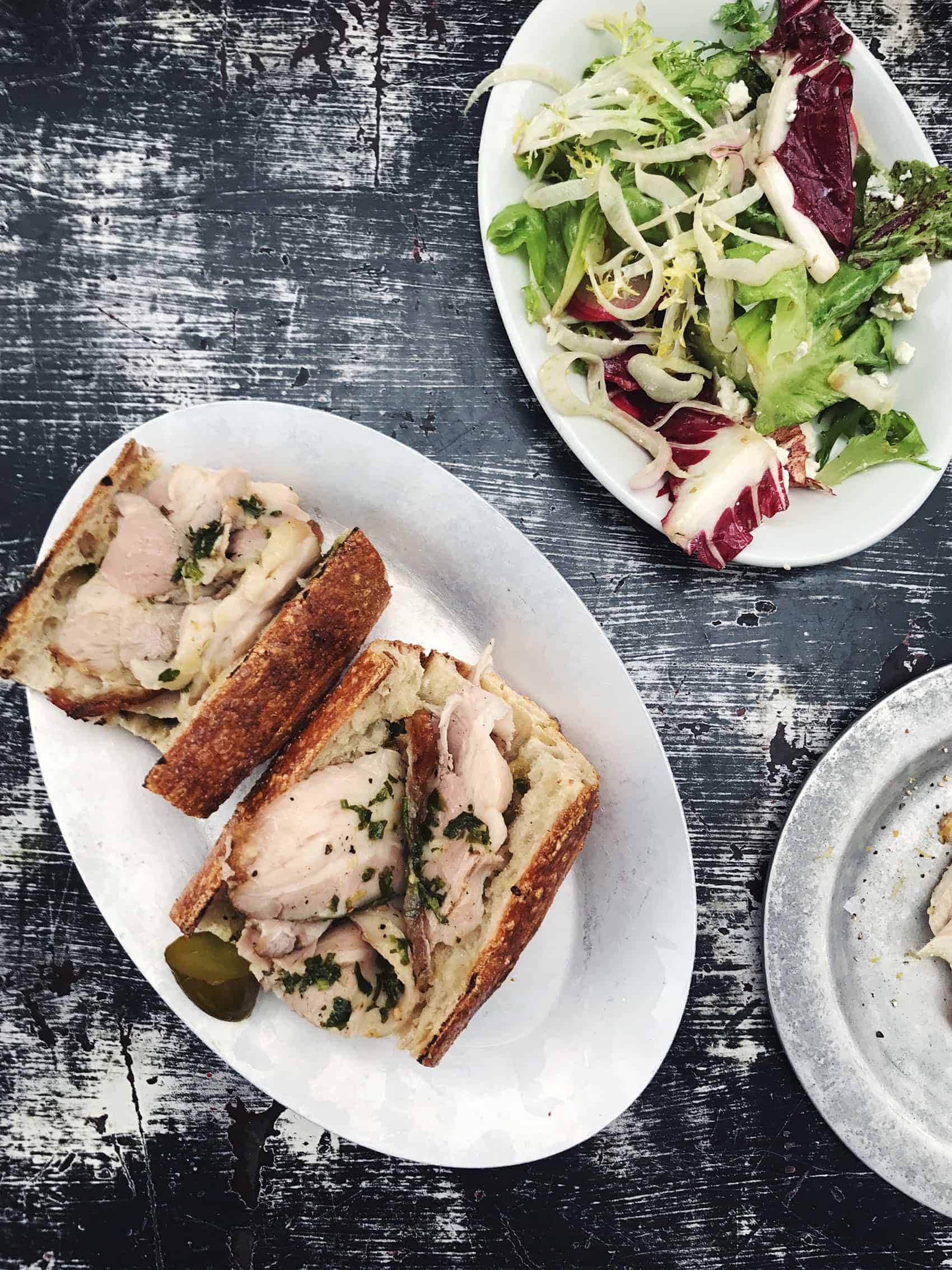 Lunch at Gjusta in Los Angeles | Porchetta sandwich with a side salad 