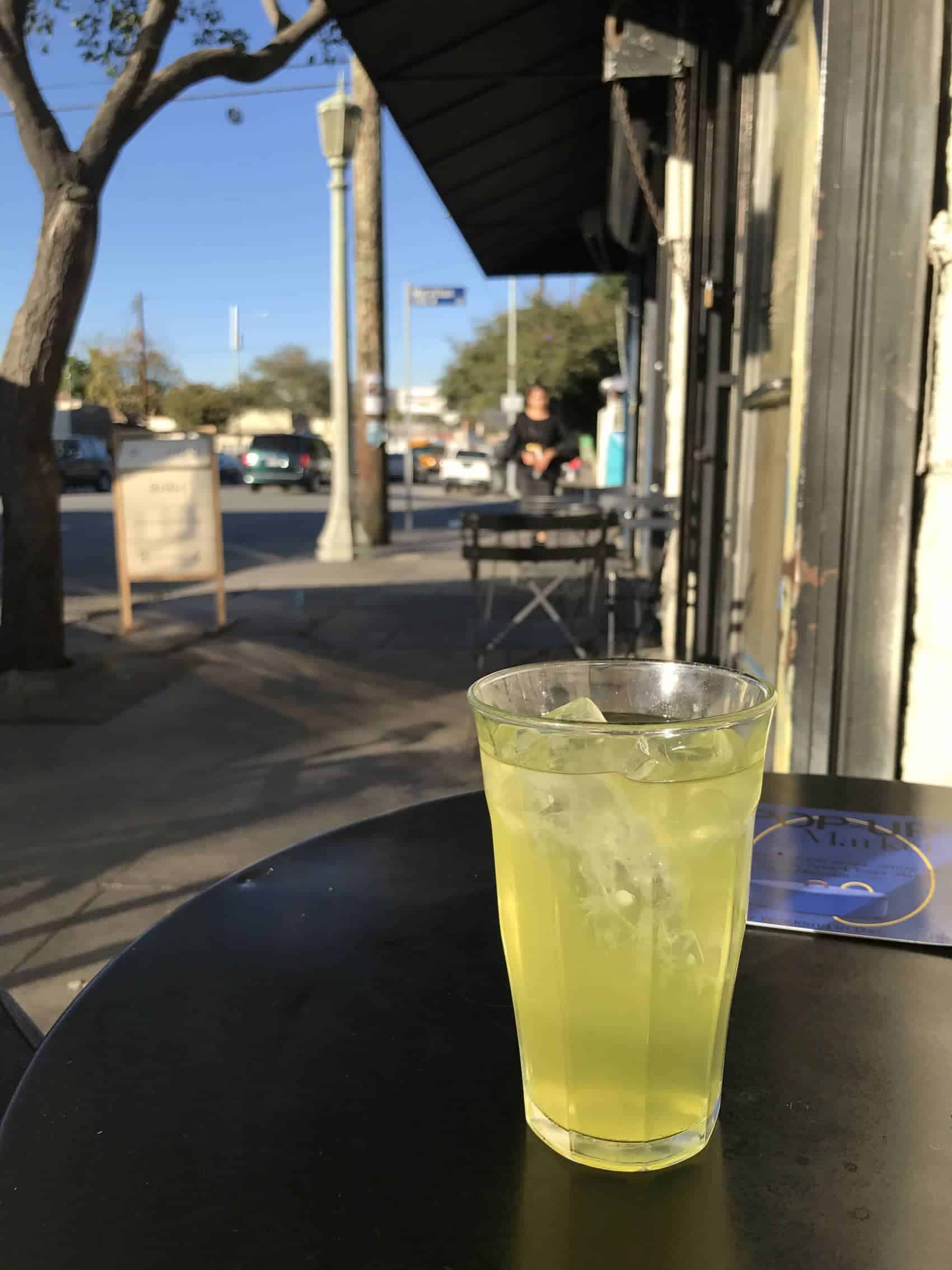 Iced green tea on a sidewalk table at Sqirl restaurant in Los Angeles