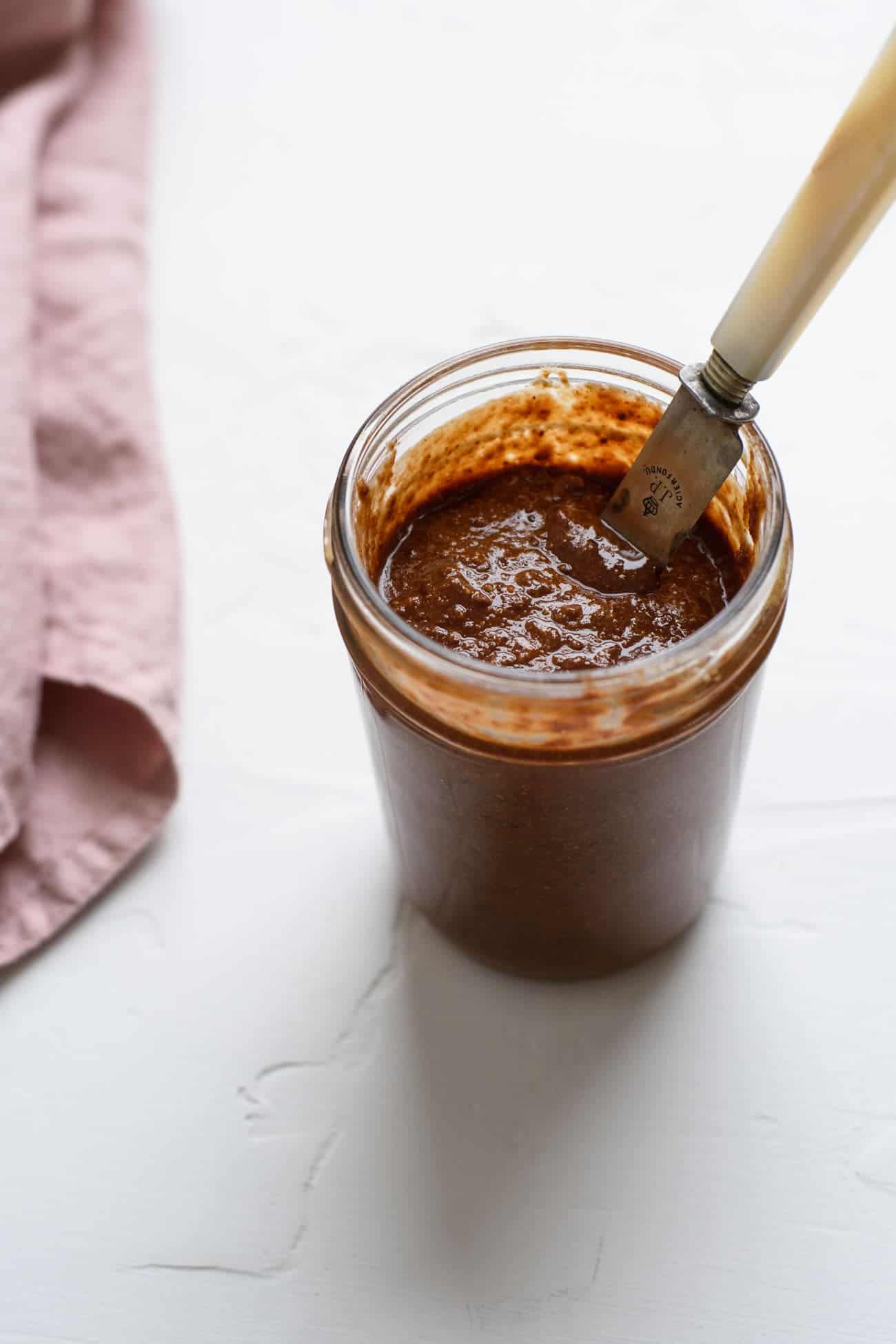 Homemade chocolate hazelnut spread (DIY Nutella) spread in a mason jar