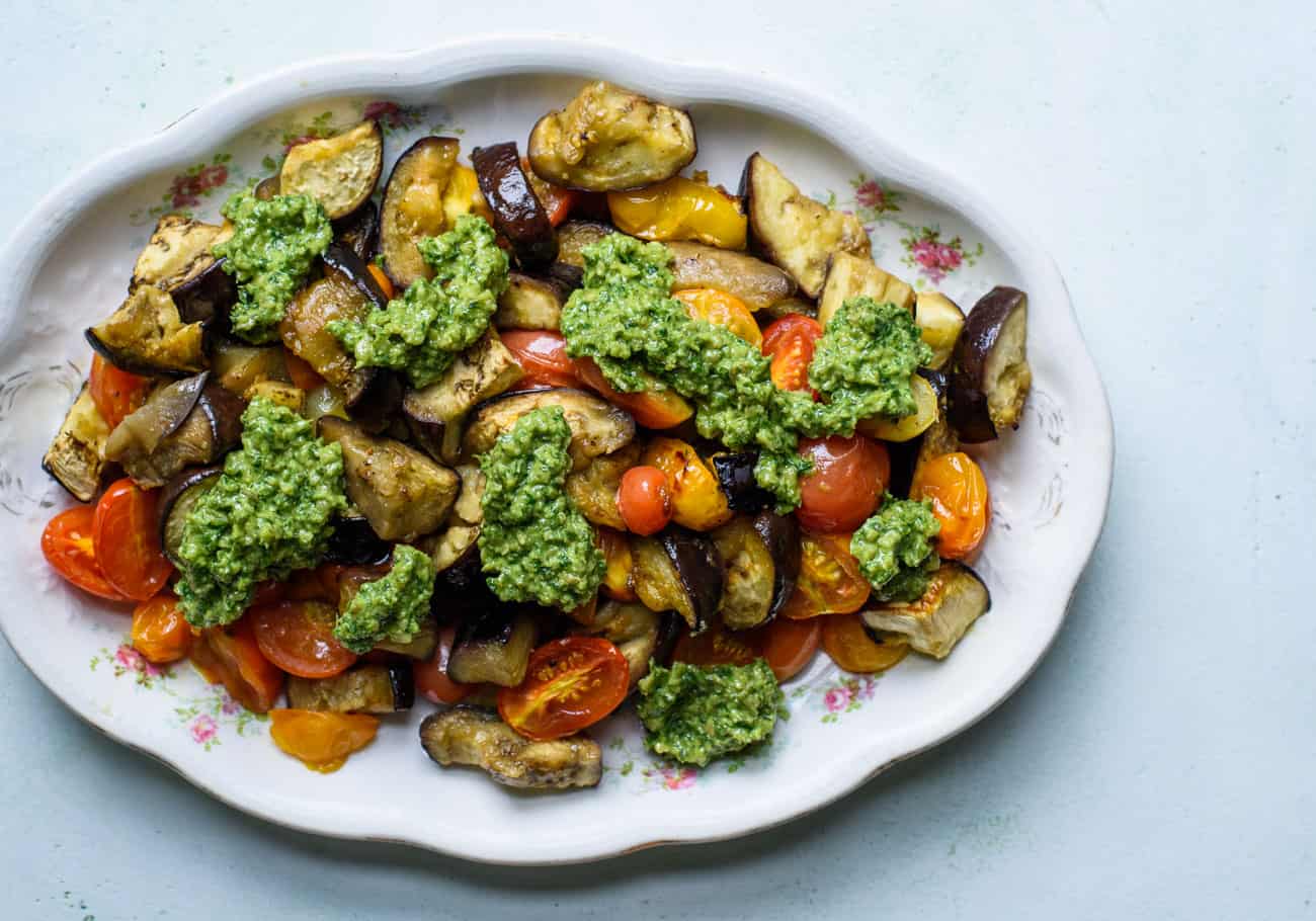 Vintage oval platter with roasted eggplant and tomatoes with pesto