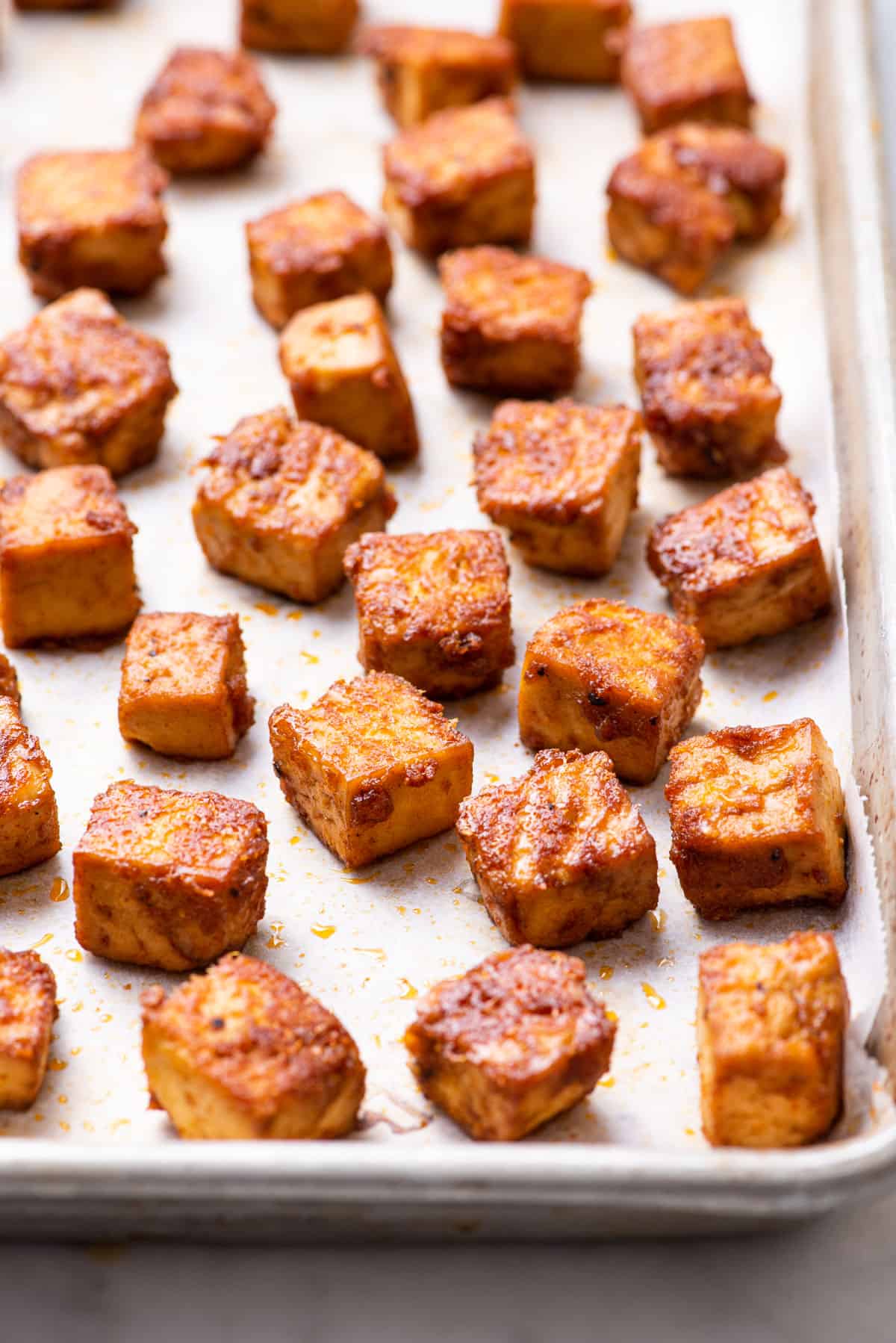 Meal prep tofu cubes baked in a salty-sweet glaze.