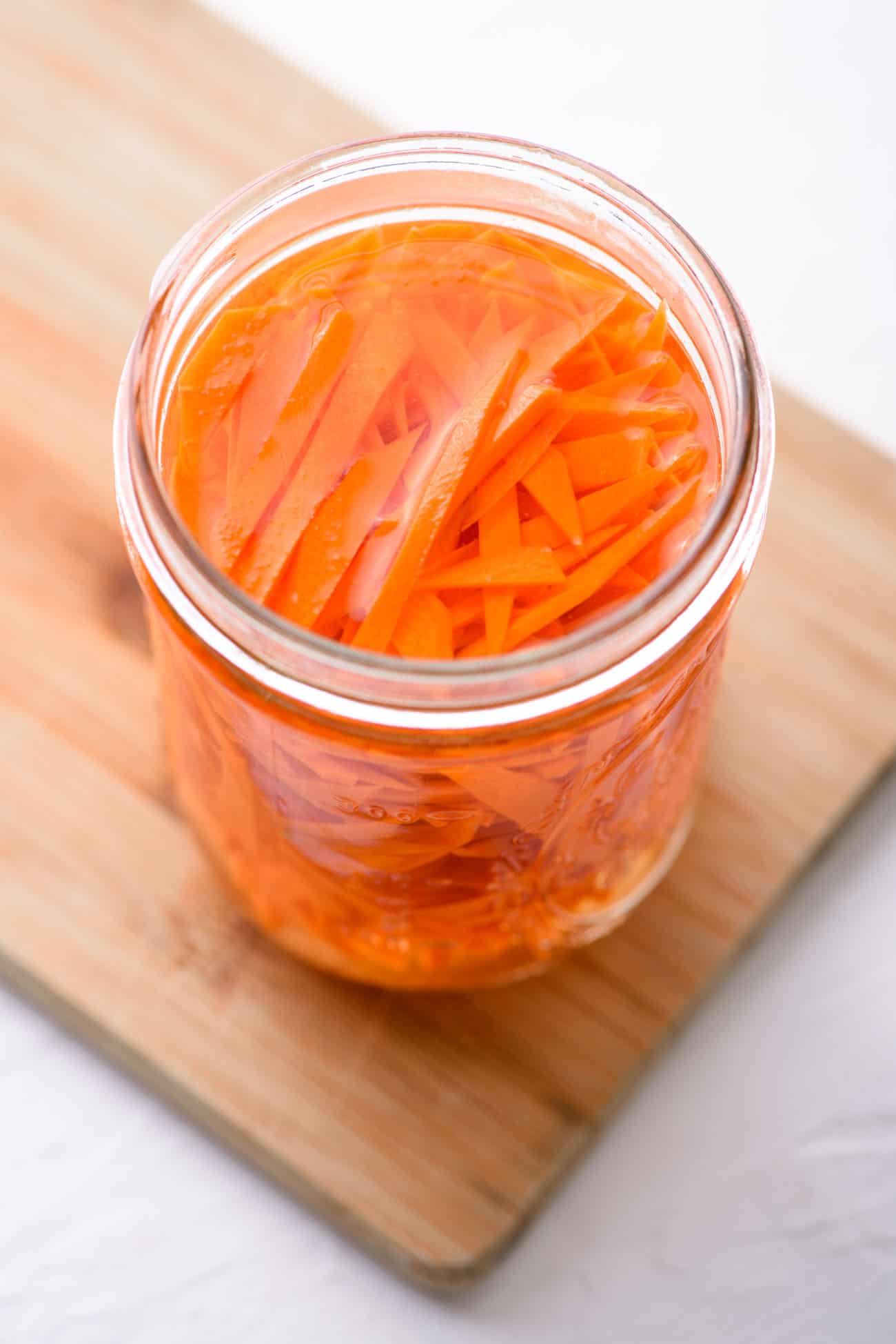 Quick-pickled carrots in a mason jar