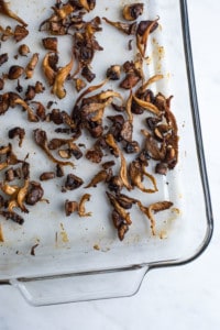 Roasted mushrooms in a glass Pyrex dish