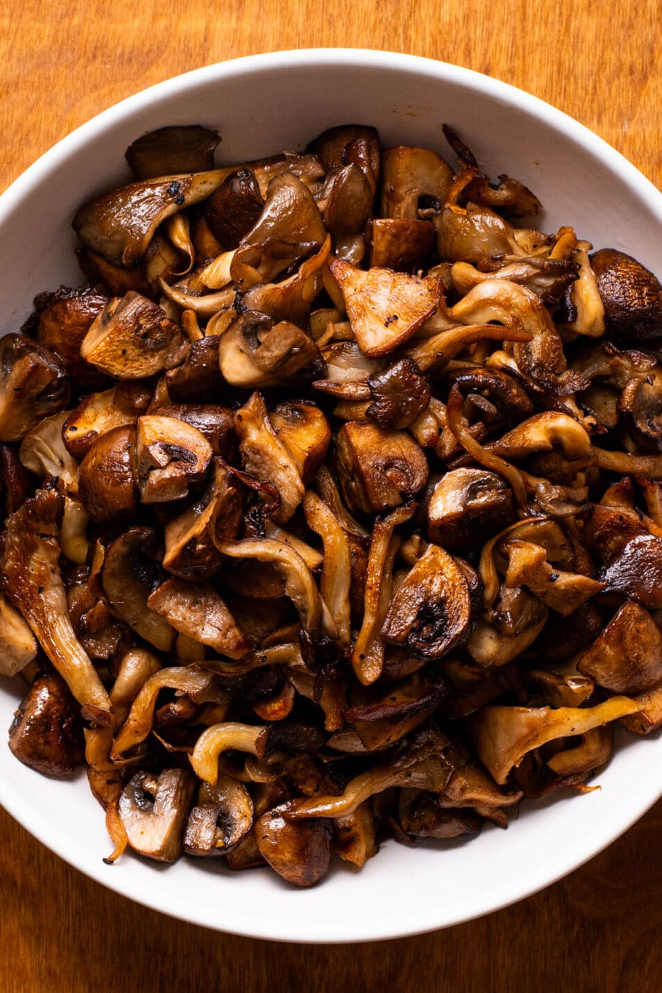 Seared mushrooms in a bowl.