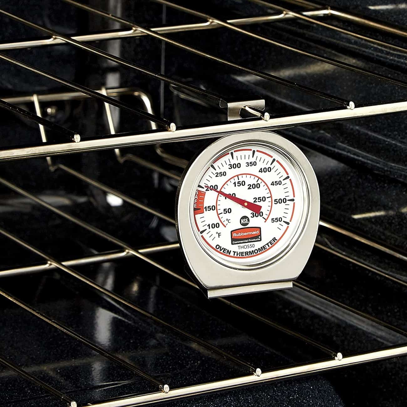 Oven thermometer hanging off oven rack