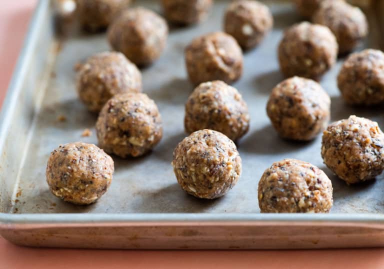 Peanut butter energy balls on a small baking tray