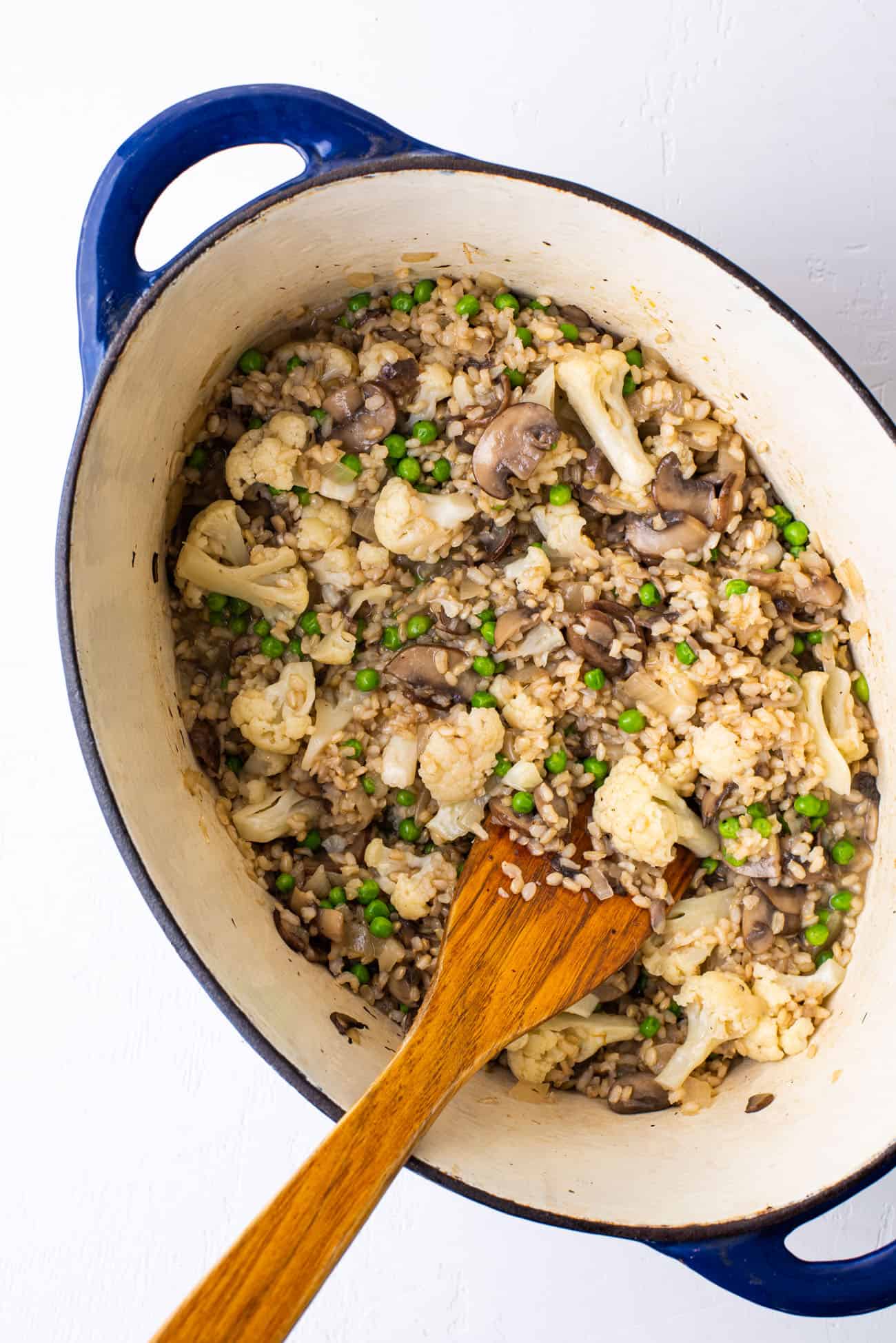 Lazy faux mushroom risotto in a blue Dutch oven