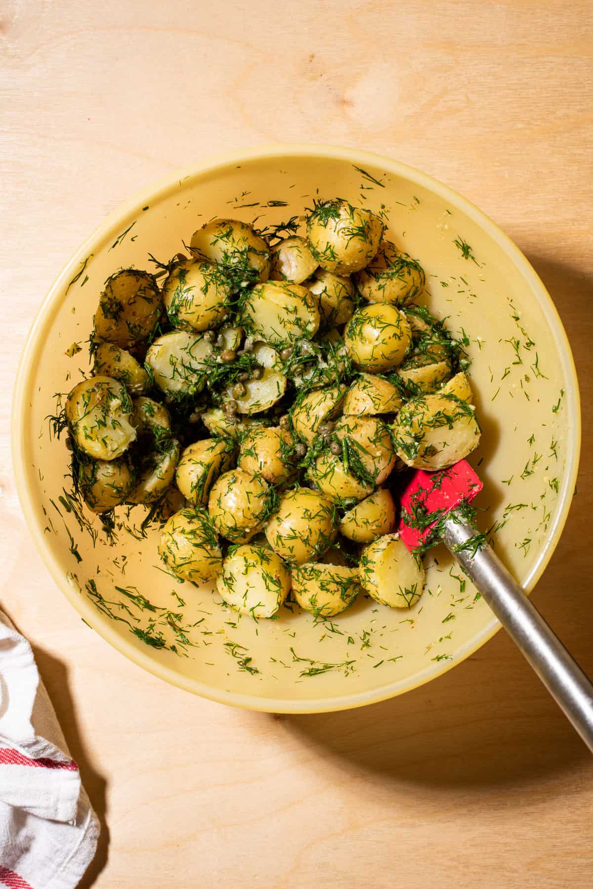 Boiled baby potatoes tossed with dill and olive oil.
