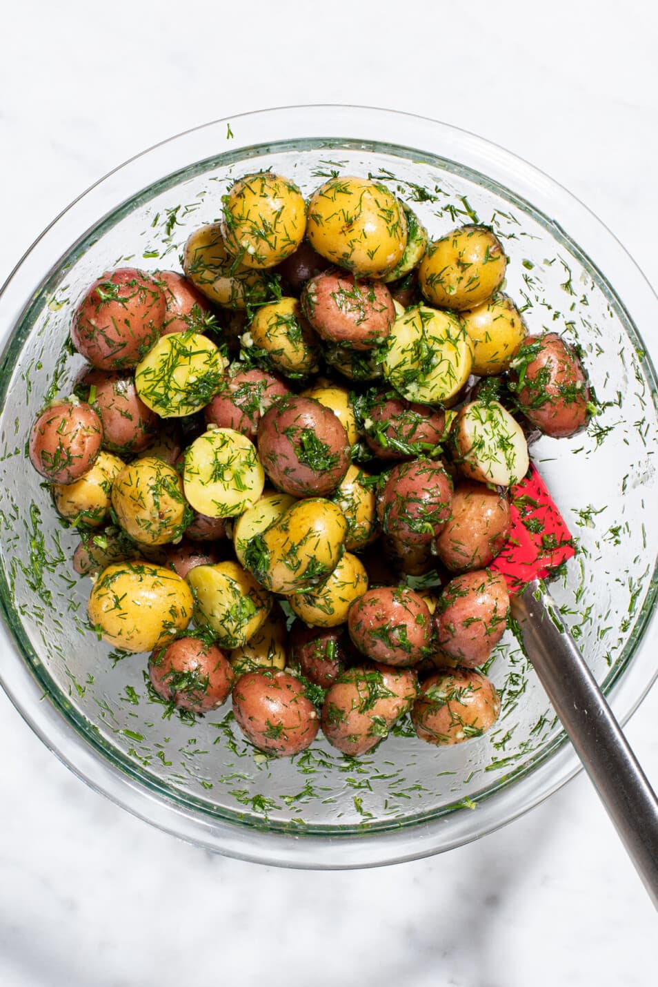Boiled new potatoes tossed with dill and garlic.