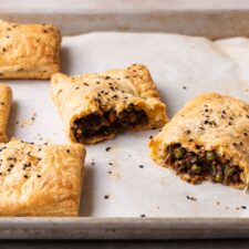 Vegan savory hand pies with mushroom filling and store-bought puff pastry.