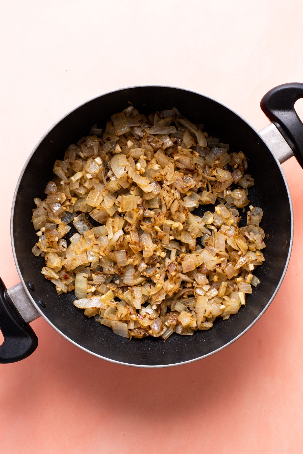 Browned onions in a pan.