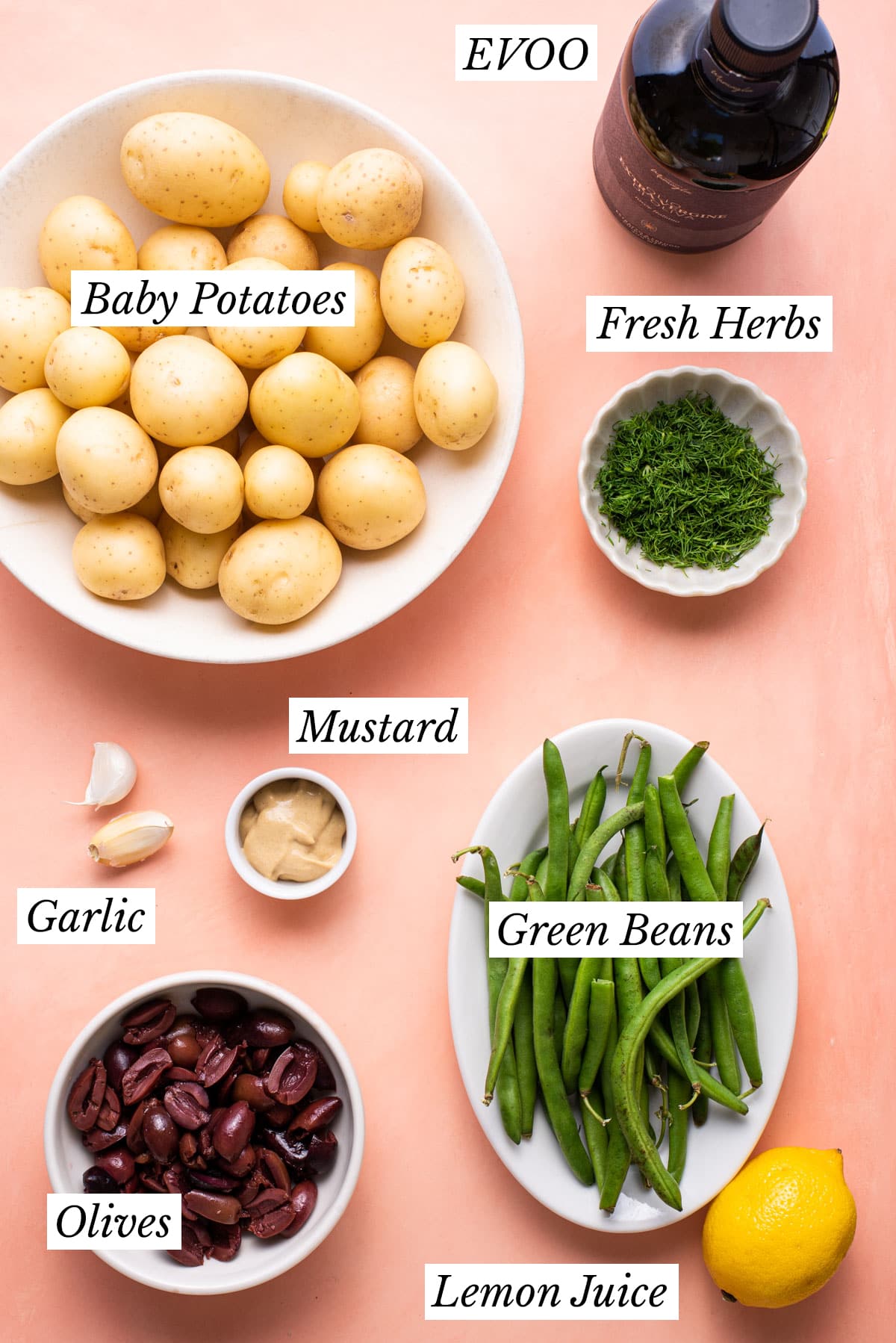 Ingredients gathered to make warm potato salad with olives and green beans.