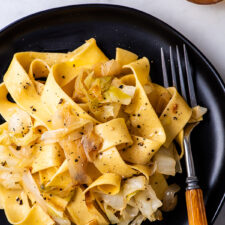 Cabbage pappardelle pasta with black pepper.
