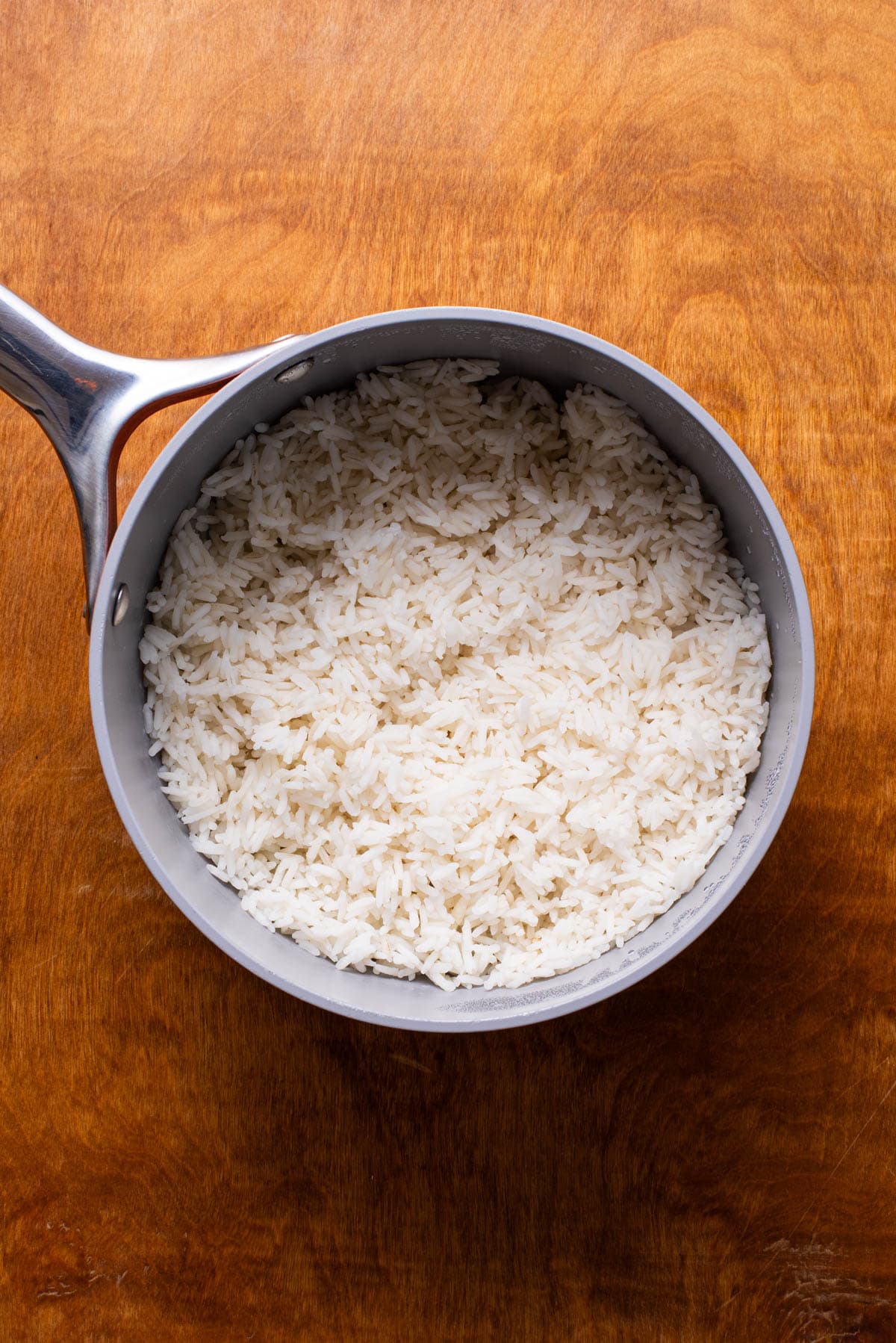 Cooked white rice in a pot.