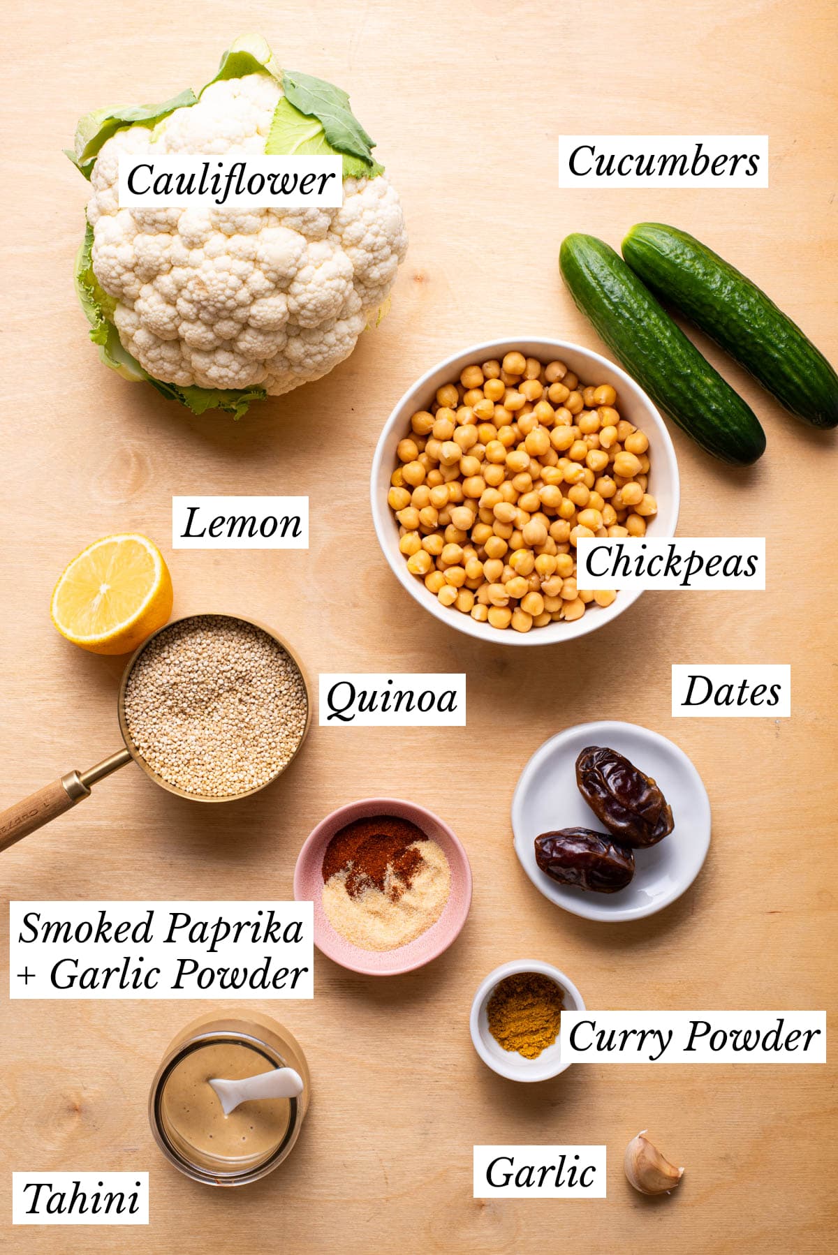 Ingredients gathered to make vegan quinoa bowls with roasted cauliflower and chickpeas.